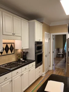 Before kitchen in North Raleigh showing original layout prior to wall relocation and full remodel by A&M Remodeling.
